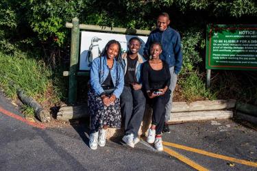 A group poses outdoors