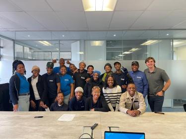 Sean with EESA Clients and Team