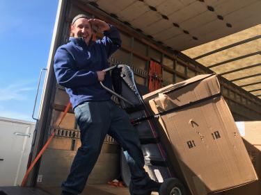 Employee using the Dolly