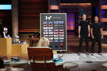 Herzberger and Kue on stage at Shark Tank