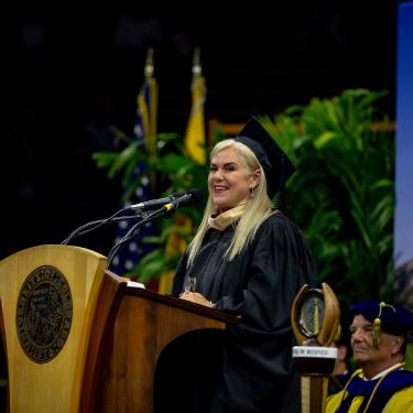 Shannon Sisler addresses students at graduation