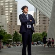 Diego Alvarez poses in downtown Manhattan near the World Trade Center.