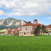 The Koelbel building with the Flatirons in the background