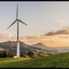 Wind Turbine in a Field with Mountains in the Background