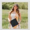 Jaidyn Shirley poses in graduation regalia in a photo with a polaroid-style frame