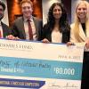Daniels Fund Case Competition winners pose with a check