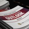 A stack of the Business Economic Outlook Forum booklets from 2023.