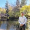 Axton Salim poses outdoors