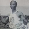 A black-and-white photo of David Bolen running on a track.