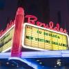 outside of the Boulder Theater with CY New Venture Challenge written on the sign