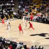 CU buffs basketball team on Coors Event center court playing UNM