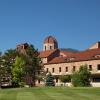 Koelbel Building with the Flatirons in the background