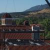 Final steel beam being installed in the business and engineering expansion at CU Boulder