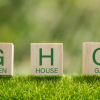 Stock image of wood blocks that spell out GHG or Greenhouse Gas Emissions