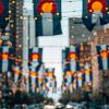 Larimer Square in Denver, with Colorado state flags flying in the background.