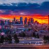 The sun rises over Denver.