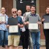 Executive Leadership attendees holding their certificates