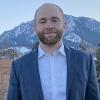 Ryan Adzima, with the mountains in the backdrop.