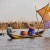 People working in a boat in Benin