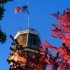 Image of CU Boulder Campus with American Flag for Veteran's Day