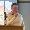 Shaun Davies speaks from a lectern