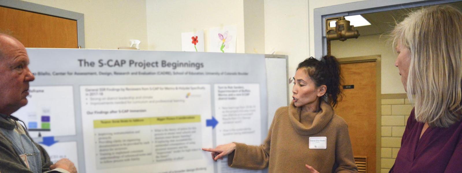 Elena explaining her poster