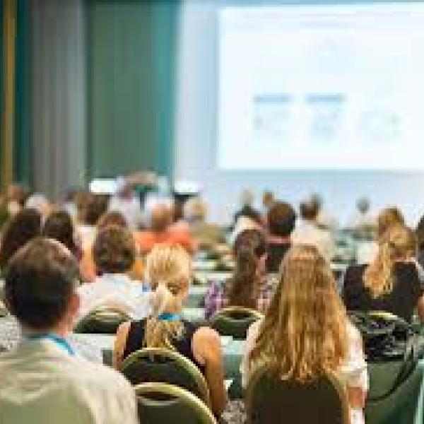 conference attendees watching a presentation