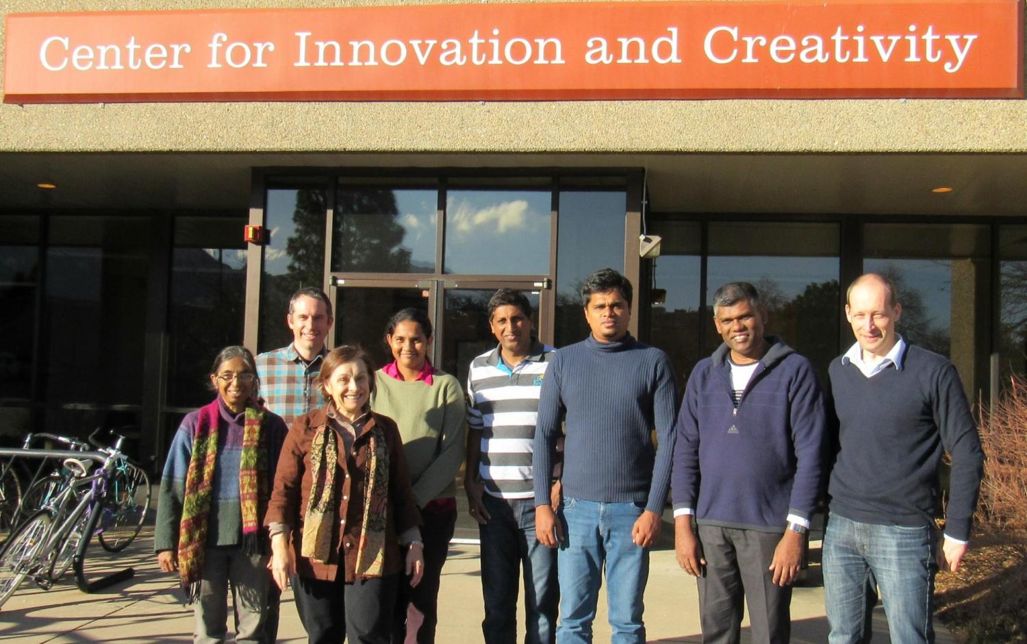 class attendees and CADSWES staff in front of CADSWES office building