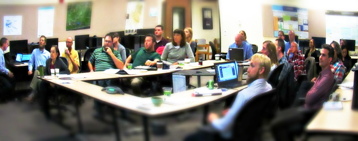 2016 Sponsor meeting attendees listening to presentation at CADSWES