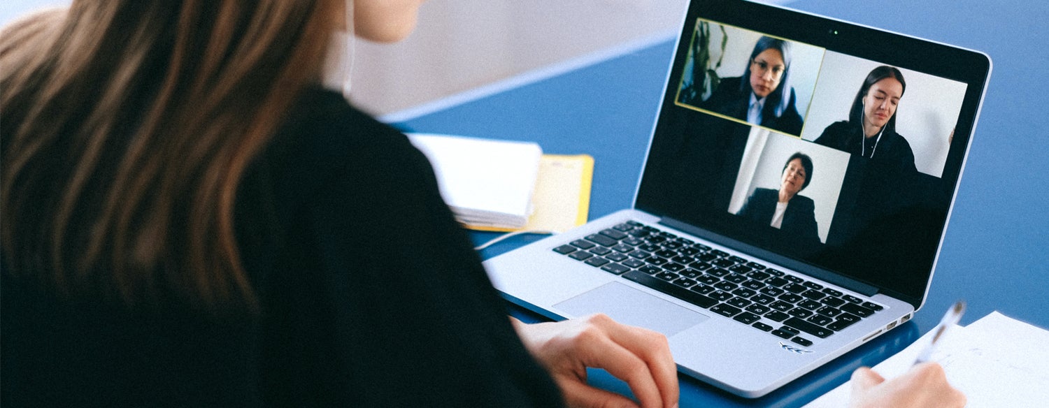 person video chatting on a laptop
