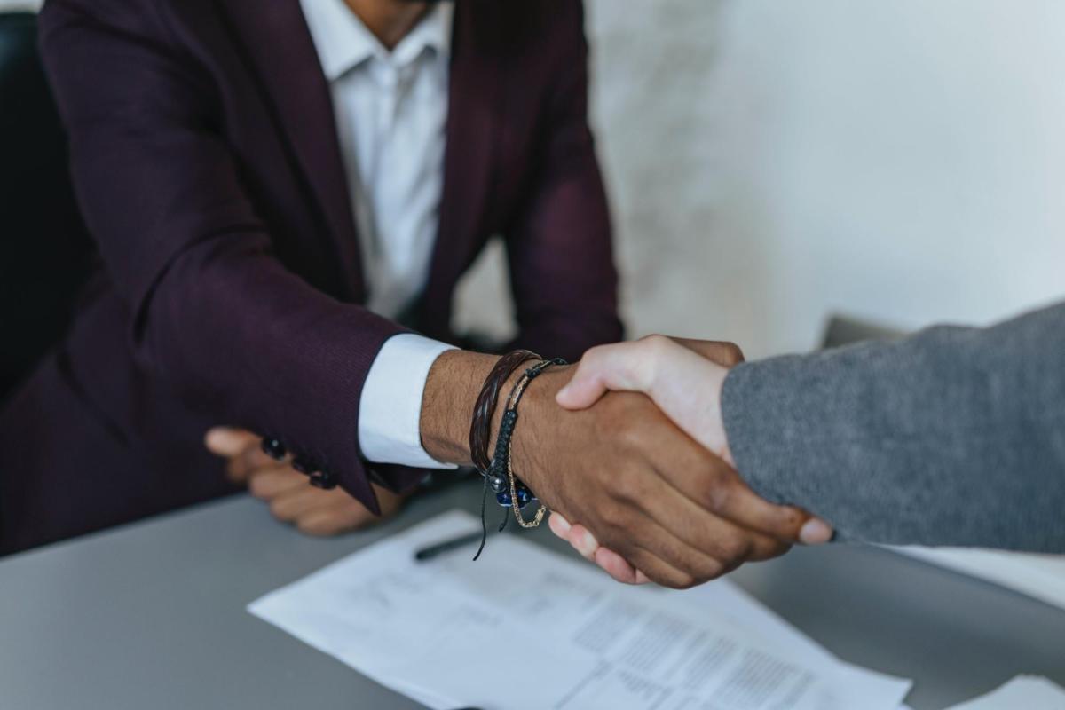a photo of two people shaking hands