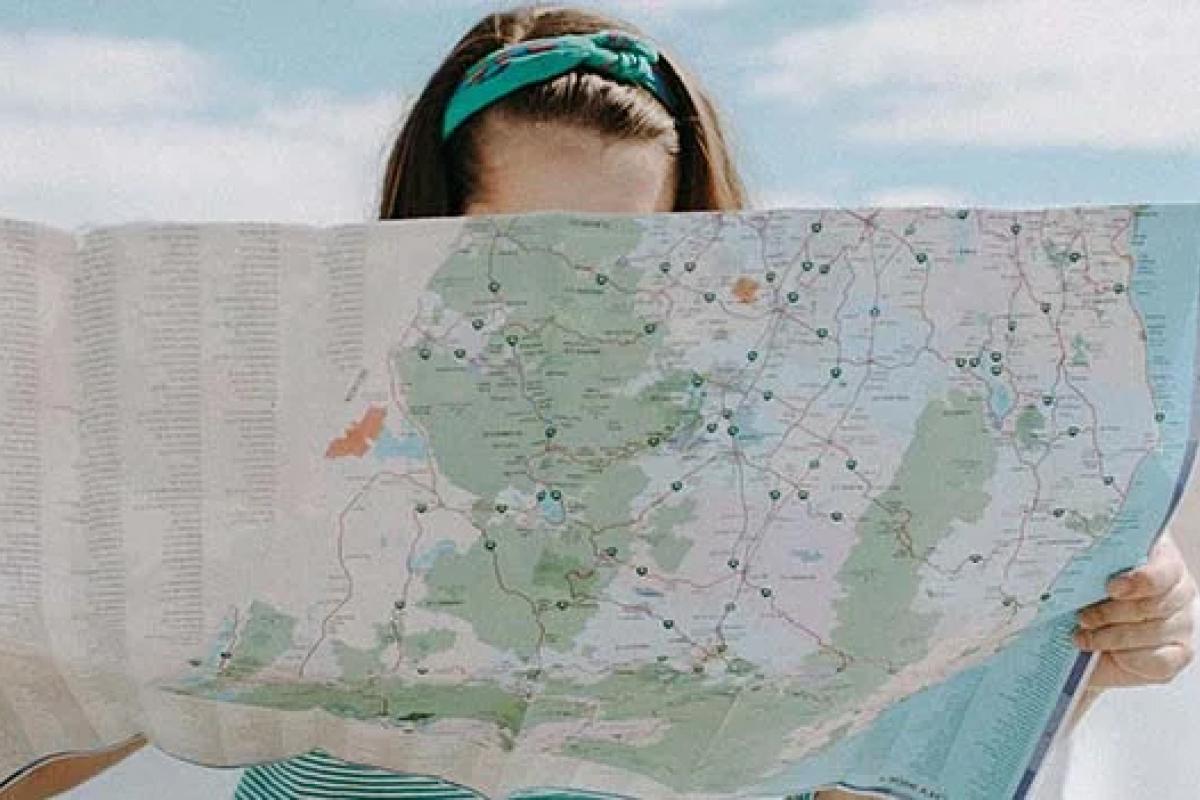 a person holding a map