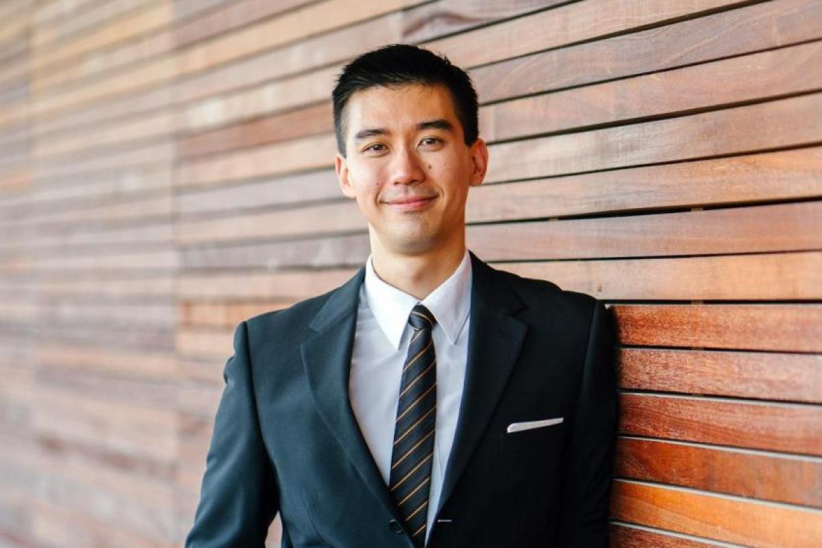 person standing in a suit
