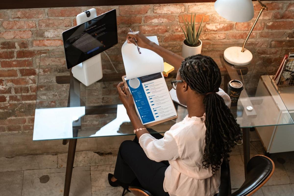 person reviewing a piece of paper