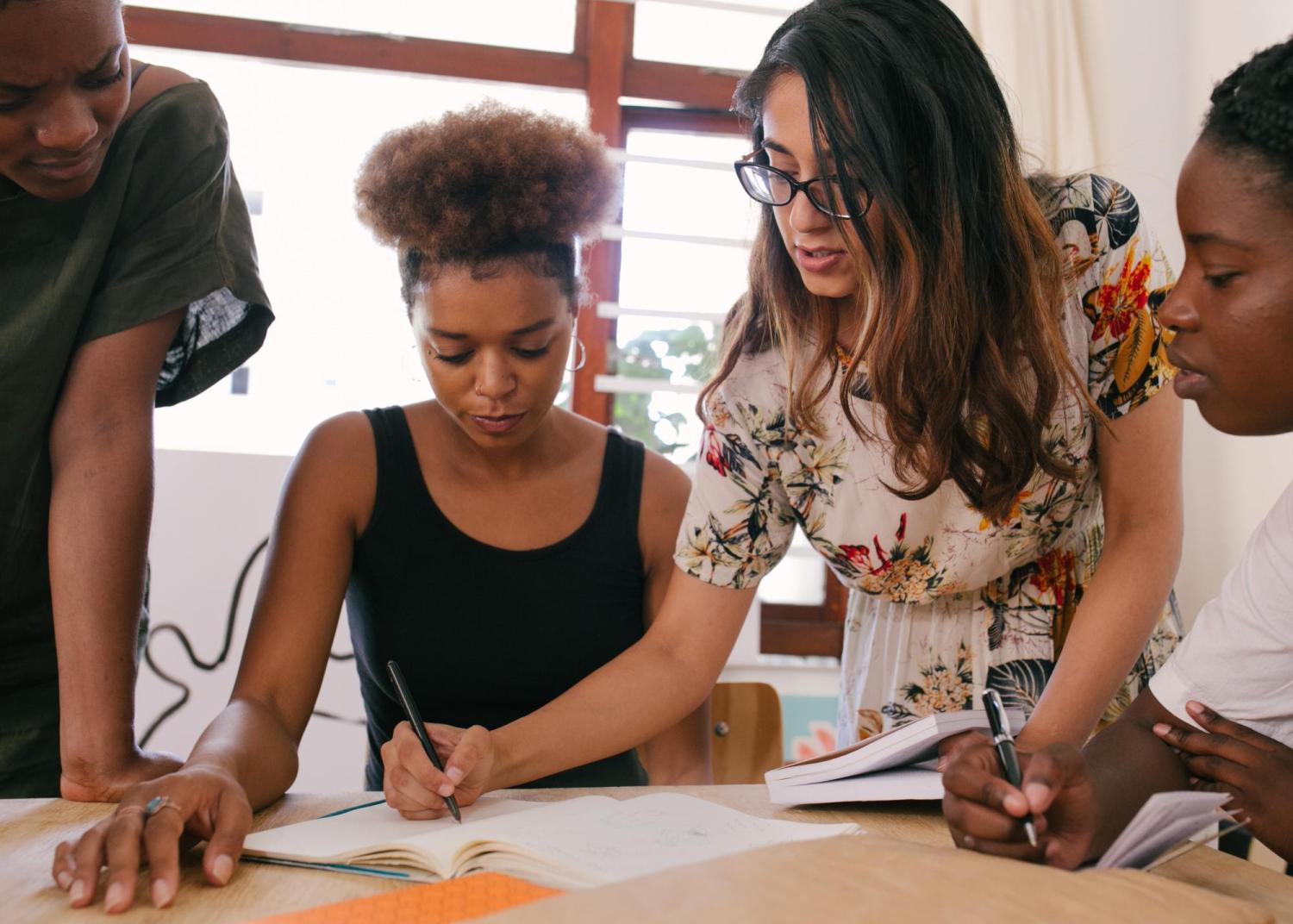 group of people working at a table