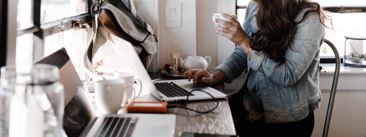 person typing on a computer