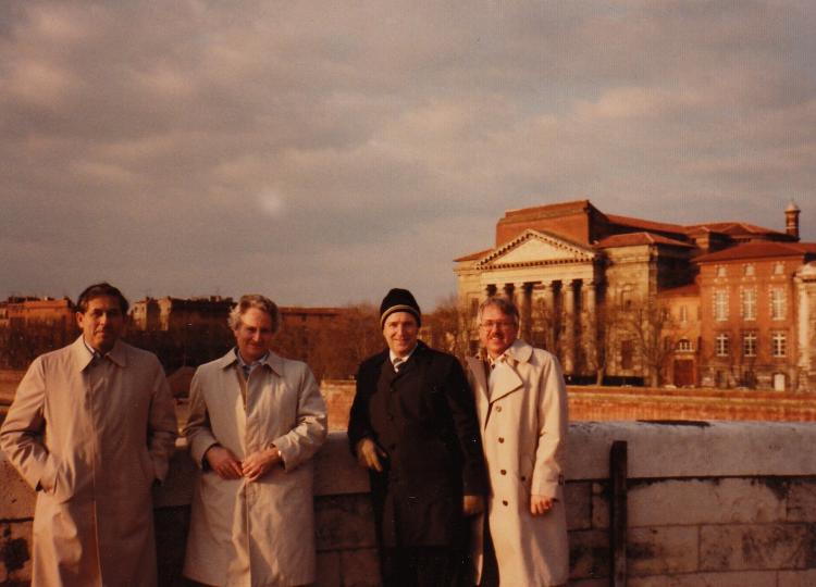 Four men in front of the University of Colorado Boulder