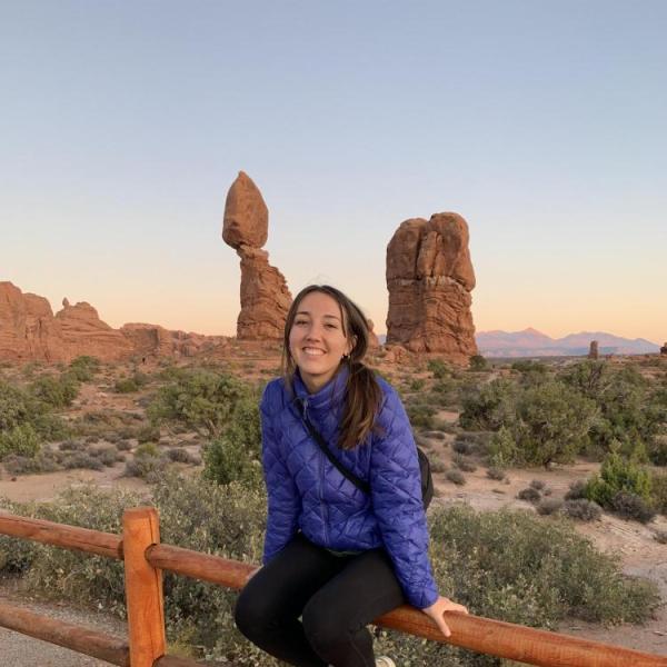 Gabriella Abello with a desert scene behind her