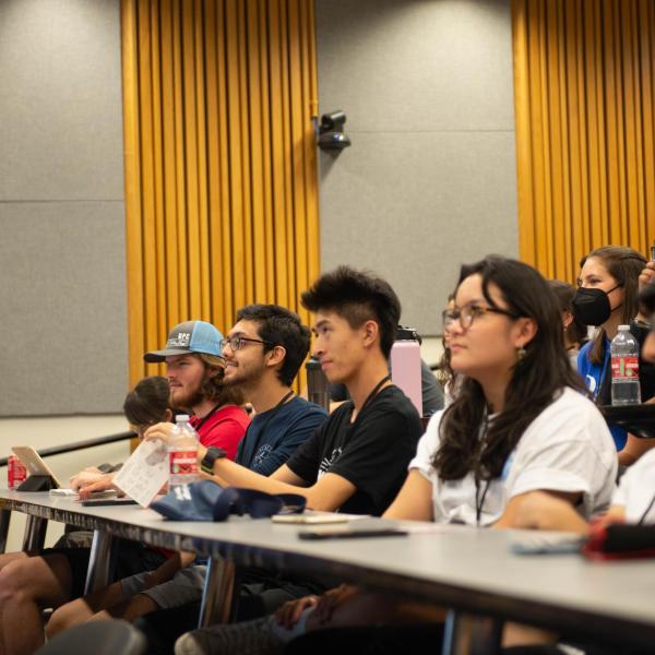 Students in a large classroom at the EIA conference