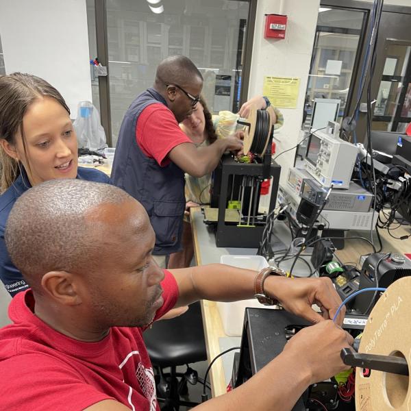 EIA conference participants working on equipment