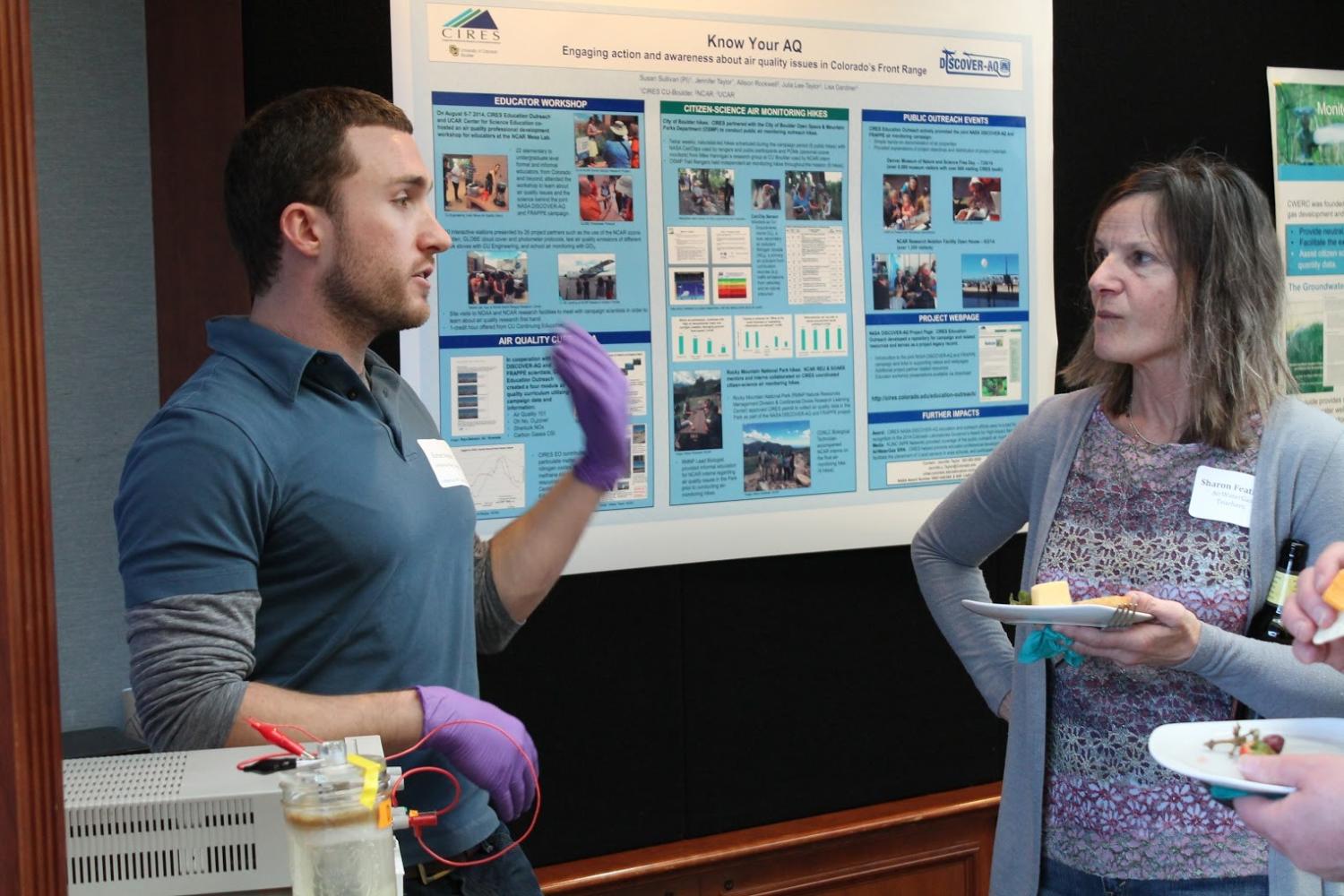 Graduate student demonstrates water treatment techniques