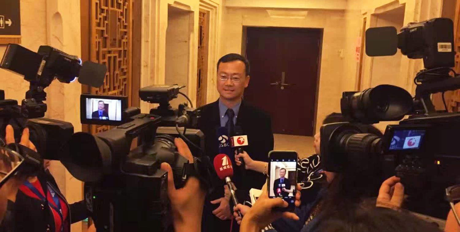 John Zhai is interviewed by the news media at the World IoT Expo.