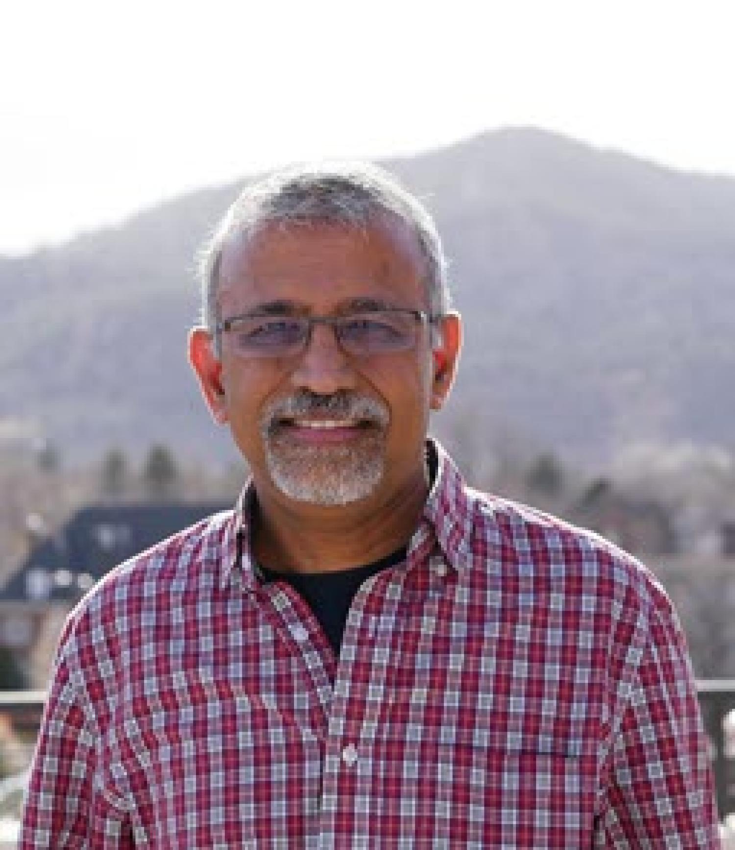 Rajagopalan Balaji with mountain in the background