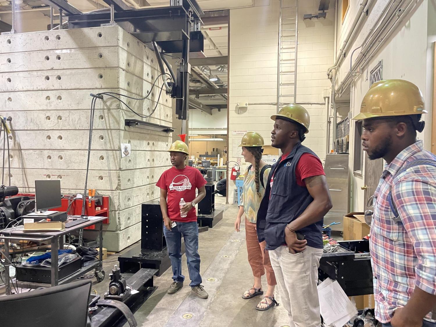 EIA visitors in hardhats at site visit