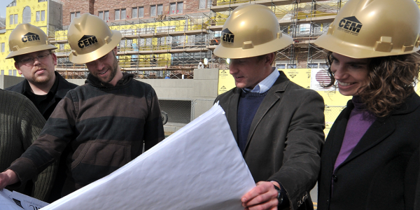 People in hard hats at a construction site