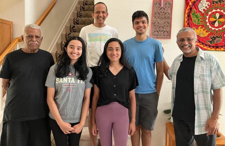Rajaram (back/center) stopped by Balaji's (right) home in July 2022 when he was driving his son, Vinu, to Berkeley to start his PhD. Balaji's uncle (left), daughters and Vinu are also pictured. Photo courtesy Rajagopalan Balaji.