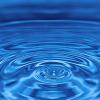 Impact of a water drop on water.