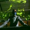 Professor John Crimaldi looking over water and lasers in his lab.