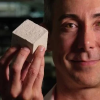 Wil Srubar holding a block of concrete