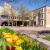 CU Engineering Center with tulips in front of it